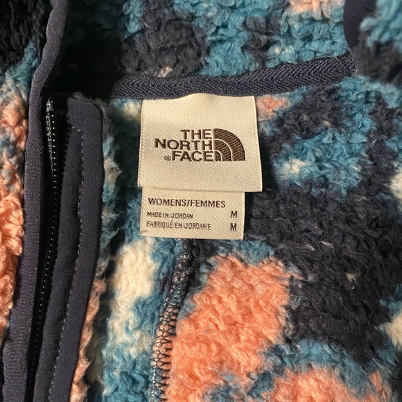 The NorthFace vest. Fleece/Sherpa material. Cozy, and warm. - Picture 2 of 2